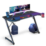 Bureau gaming en forme de Z IMGadgets | Surface en fibre de carbone 119 x 61 cm | Charge maximale 80 kg | Porte-gobelet | Crochet pour casque | Gestion des câbles | Expérience gaming ultime 